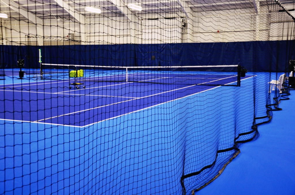 Indoor tennis upgrades: backdrop curtains, padding, and netting - All Court  Fabrics - Tennis court wind screen. Tennis windscreens. Windscreen.